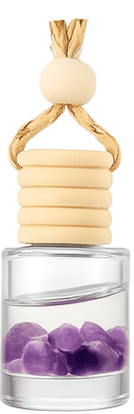 Glass bottle pheromone diffuser with purple crystals inside